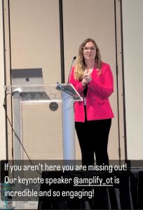 Screenshot of an instagram story with Clarice standing on stage in front of a clear podium. She is wearing a hot pink blazer. The text reads “if you aren’t here, you are missing out! Our keynote speaker @amplify_ot is incredible and so engaging!”
